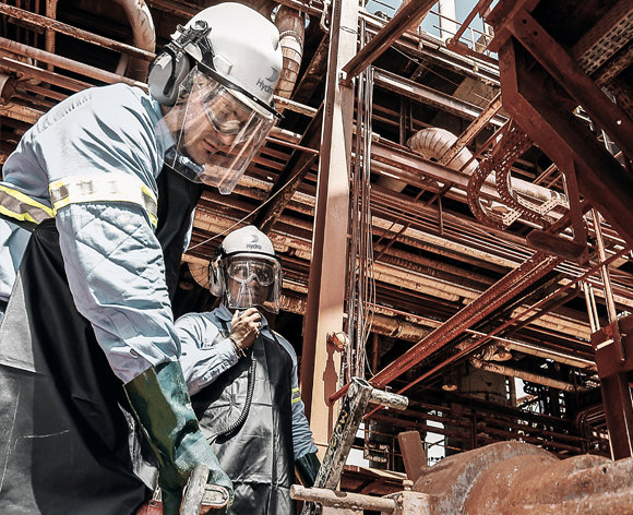 men wearing hard hats and protective gear