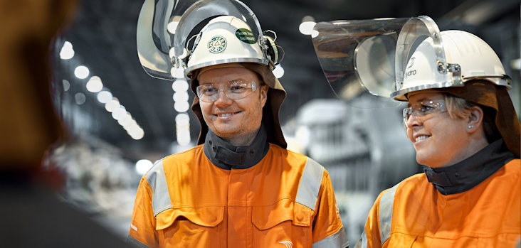 a few men wearing hard hats